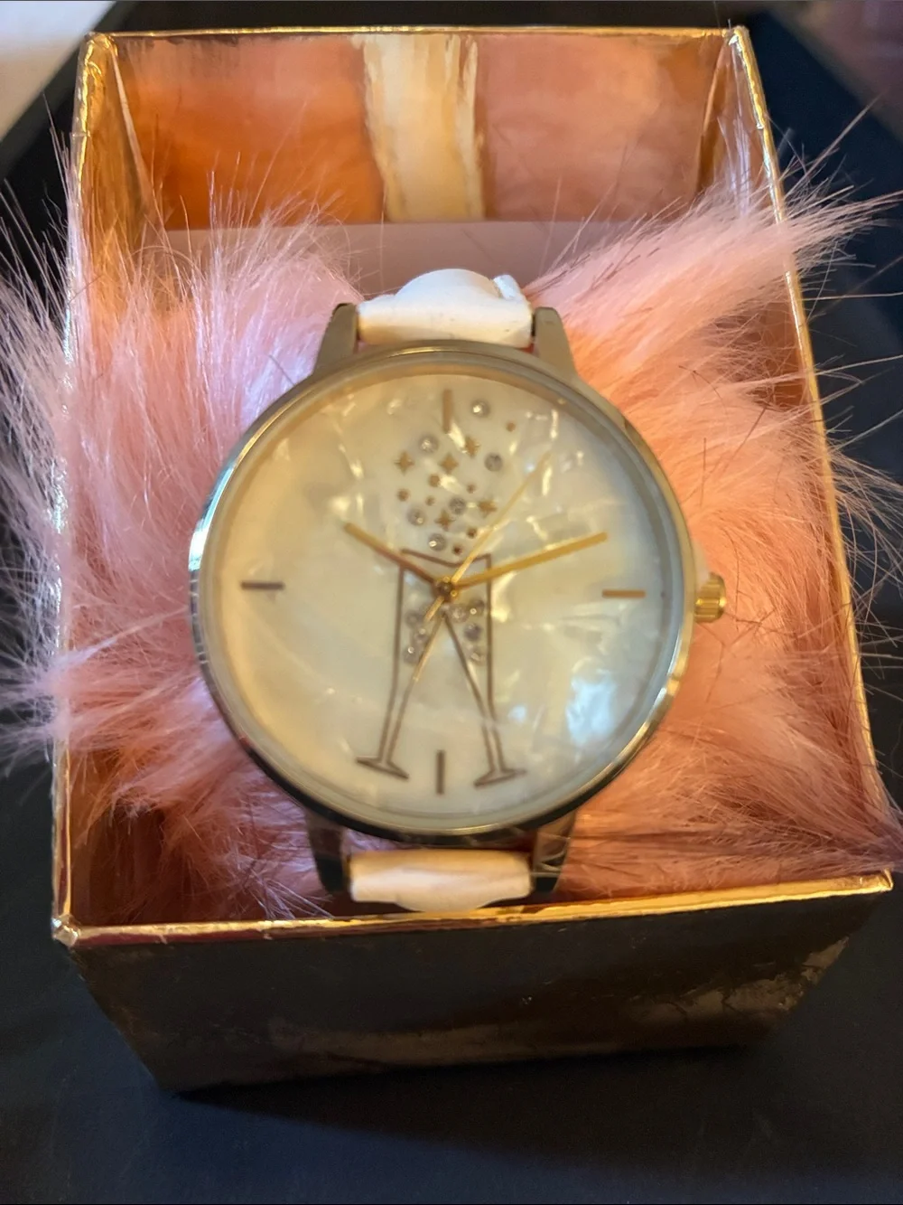Elegant White Strap Watch with champagne glasses making a cheers